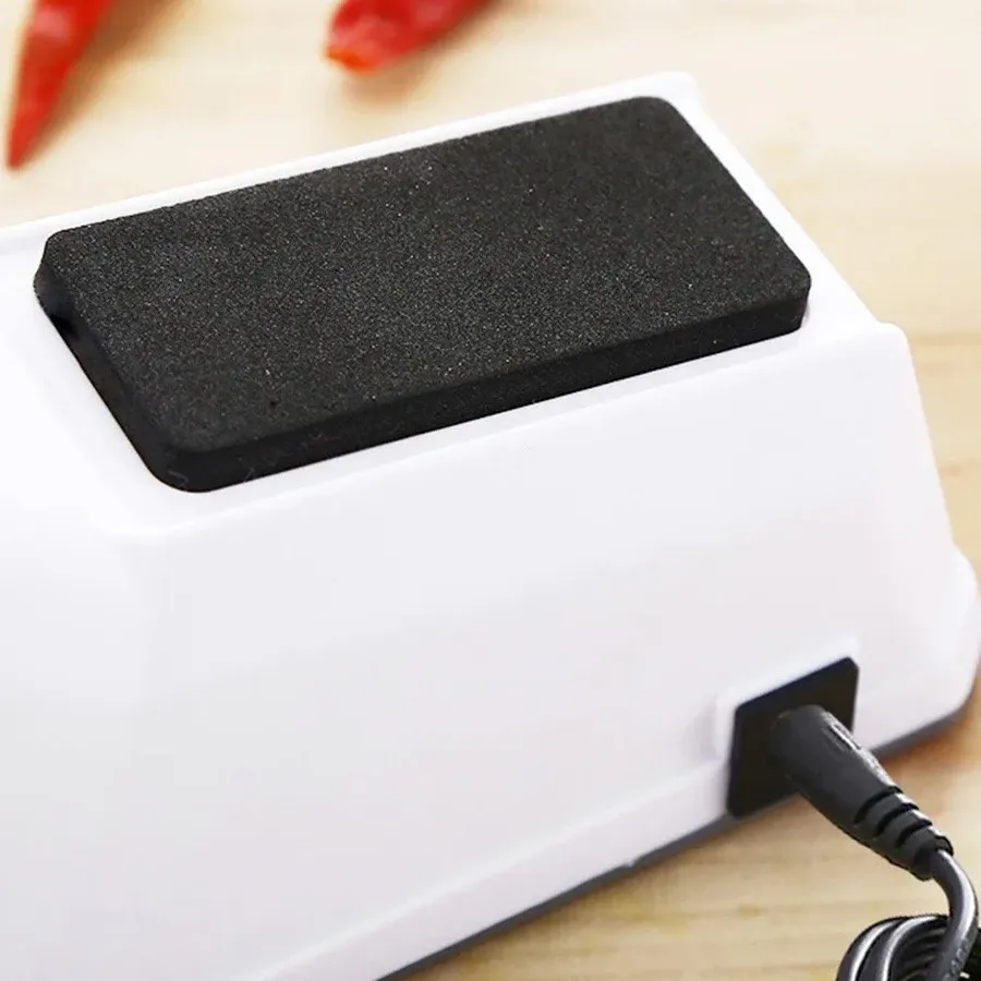 محتویات جعبه چاقو تیزکن برقی چندکاره – شامل کابل برق و راهنما – یلدا بازار اقلام داخل بستهبندی چاقو تیزکن برقی چند کاره – یلدا بازار